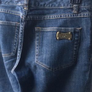 Michael Kors jeans w/big metal logo on back pocket